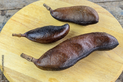 Carob.Tropical fruit called Jatoba. photo