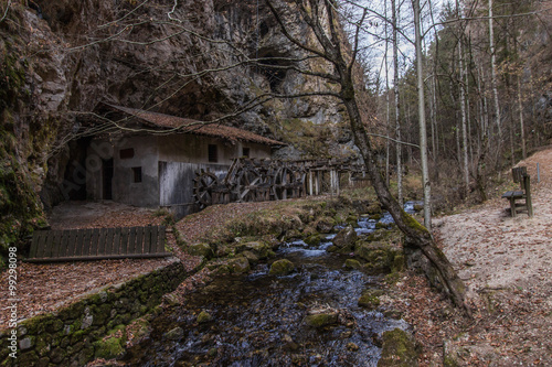 Antico Mulino / Passeggiando lungo il lago Smeraldo è possibile incamminarsi seguendo il sentiero nel quale si può ammirare il mulino.  Presso Canyon Rio Sass, Fondo (Trentino Alto Adige) Italia photo