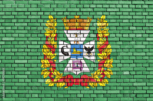 flag of Gomel Region painted on brick wall