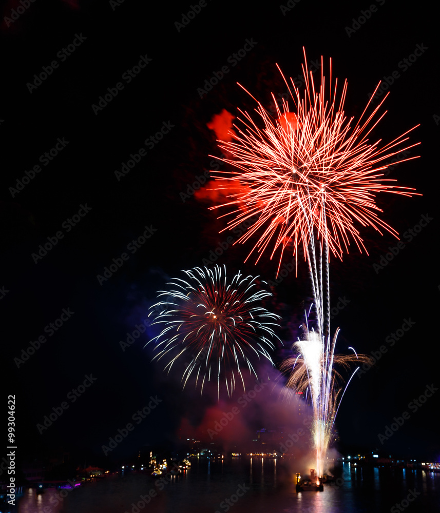 Fireworks over Chaopraya river in Bangkok Thailand