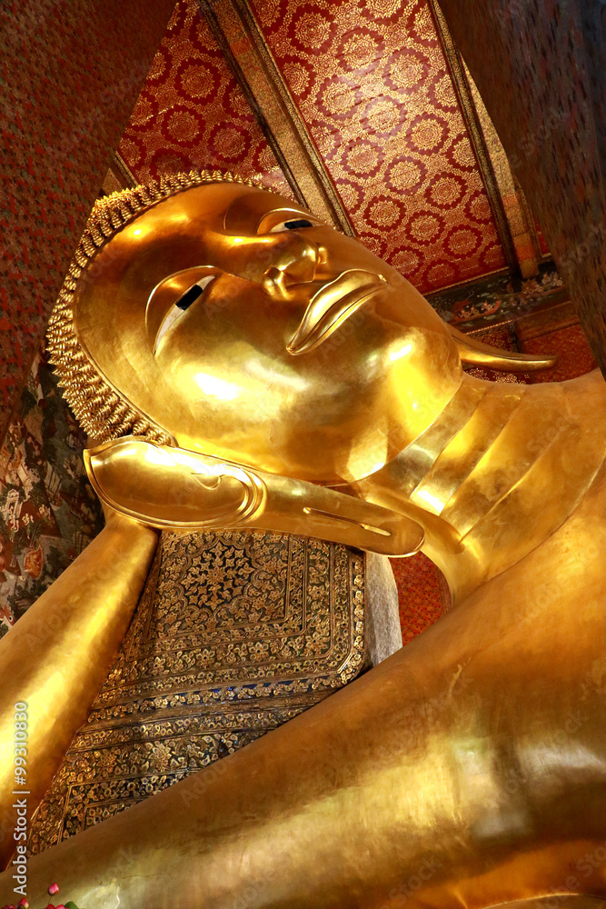 The Giant Golden Reclining Buddha (Sleep Buddha) in Wat Phra Chetuphon Vimolmangklararm Rajwaramahaviharn Temple (Locally known as Wat Pho Buddhist Temple), Bangkok, Thailand