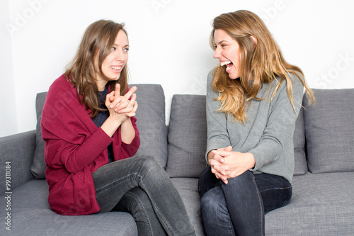 Two women having fun while talking