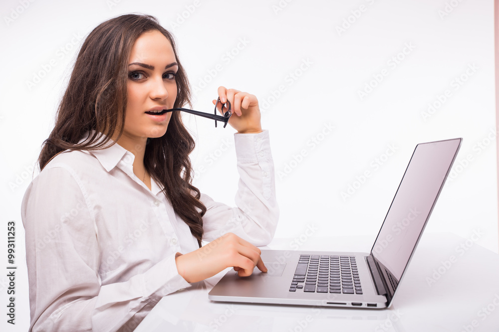 Laptop woman. Business Woman with glasses using laptop computer pc. Isolated on white background. Laptop woman. Business Woman with glasses using laptop computer pc. Isolated on white background.