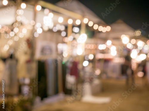 Blurred background: night market shopping with lighting decorati © littlestocker