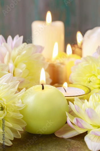 Candles and golden dahlias