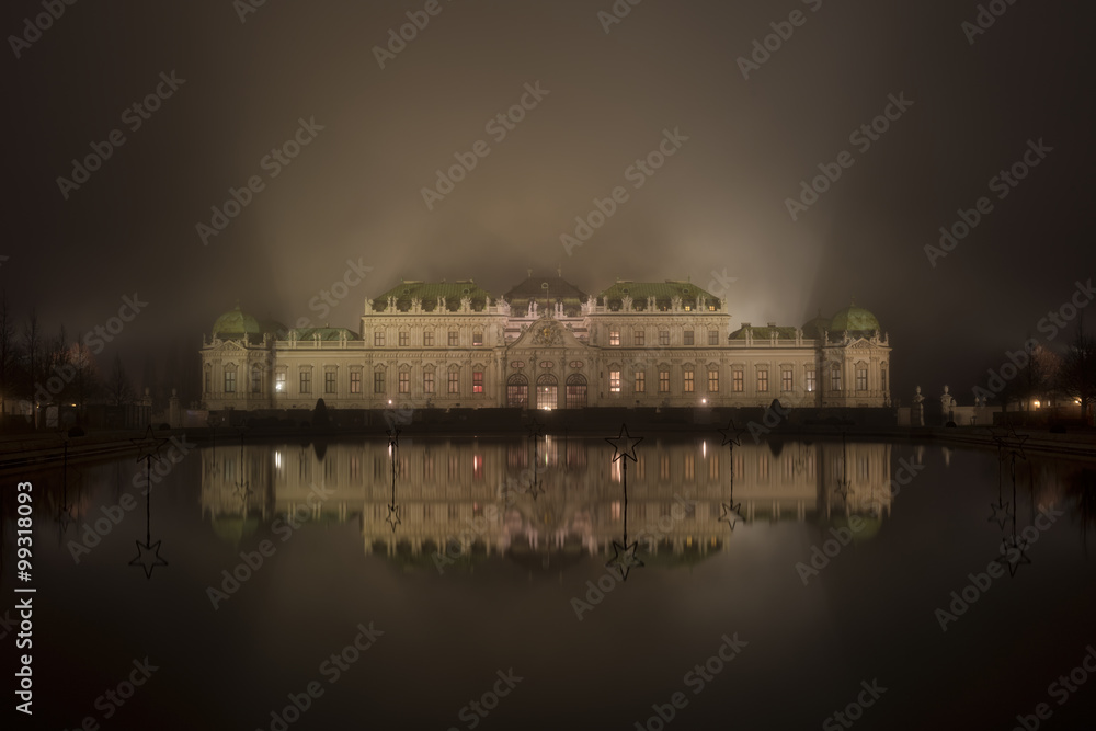 Belvedere palace in Vienna at a foggy night