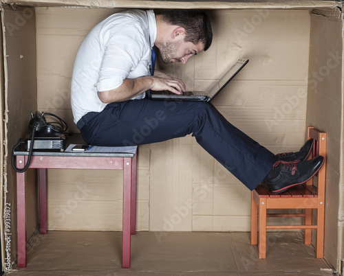 businessman in a strange position 