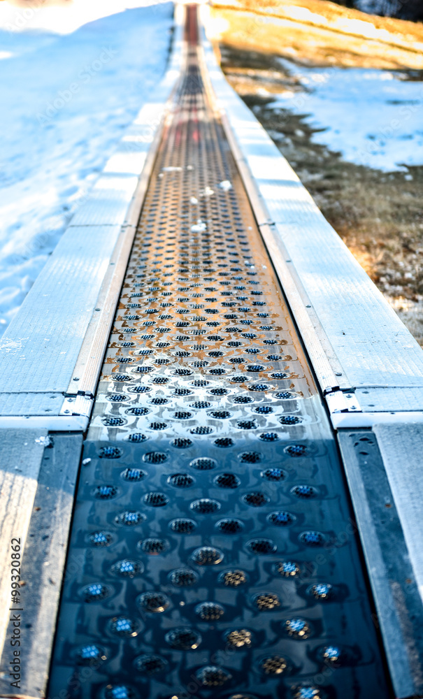 Fototapeta premium Children ski Conveyor in ski resort