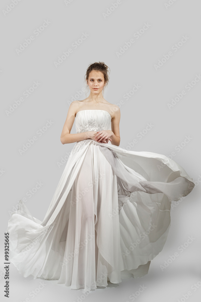 young lady posing in fashion dress