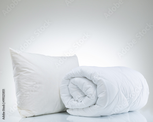 Quilt and pillow on the white background
