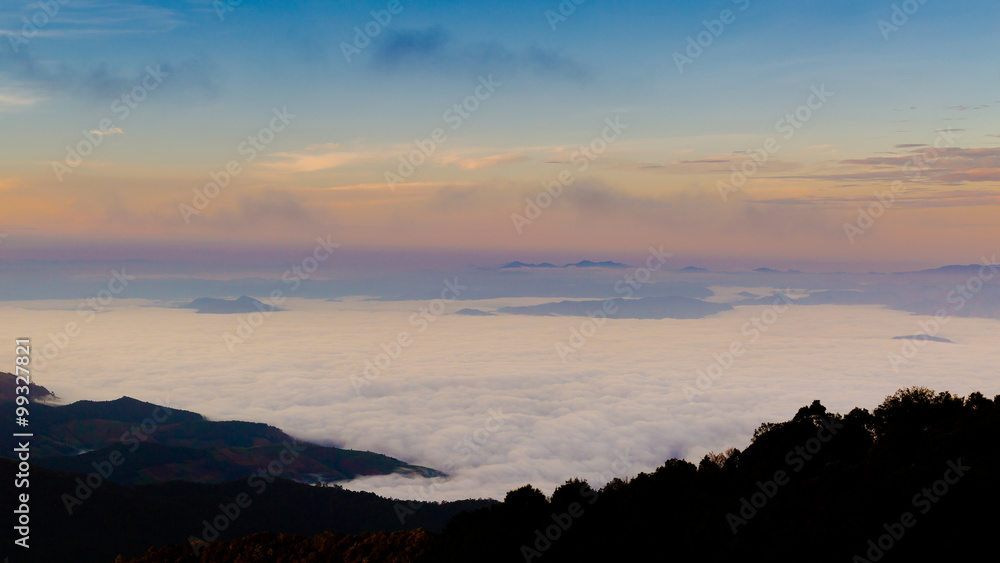mountains under mist in the morning. mountains under mist in the morning.