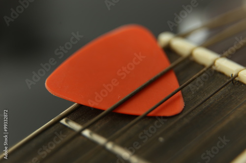 guitar and plectrum