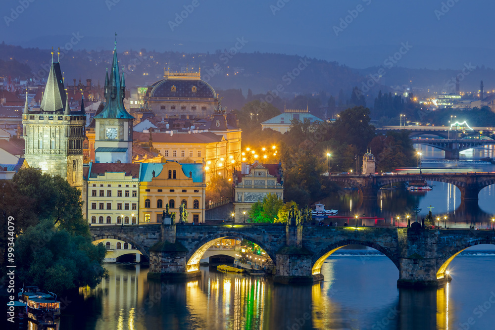 Famous View of Prague, bridges and landmarks at evening time