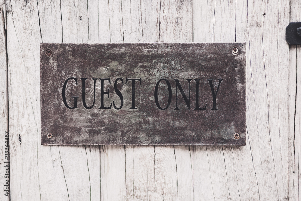 Guest only sign on the wooden door Guest only sign on the wooden door