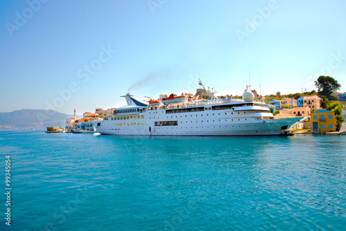 Ferry boat arriving to the sea port of Greek island Kastellorizo. Greece