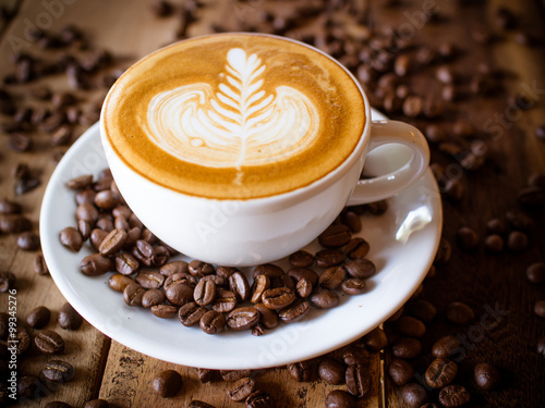 Fototapeta Naklejka Na Ścianę i Meble -  Cup of coffee latte in coffee shop