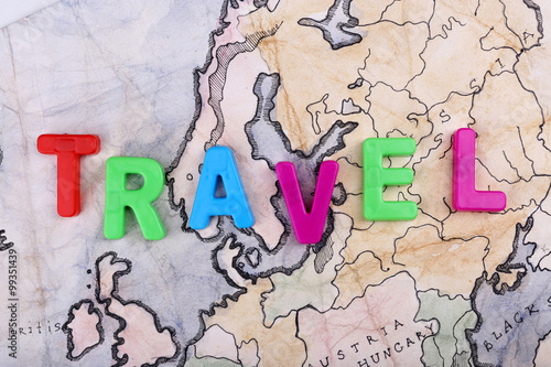 Colorful word Travel on World map background