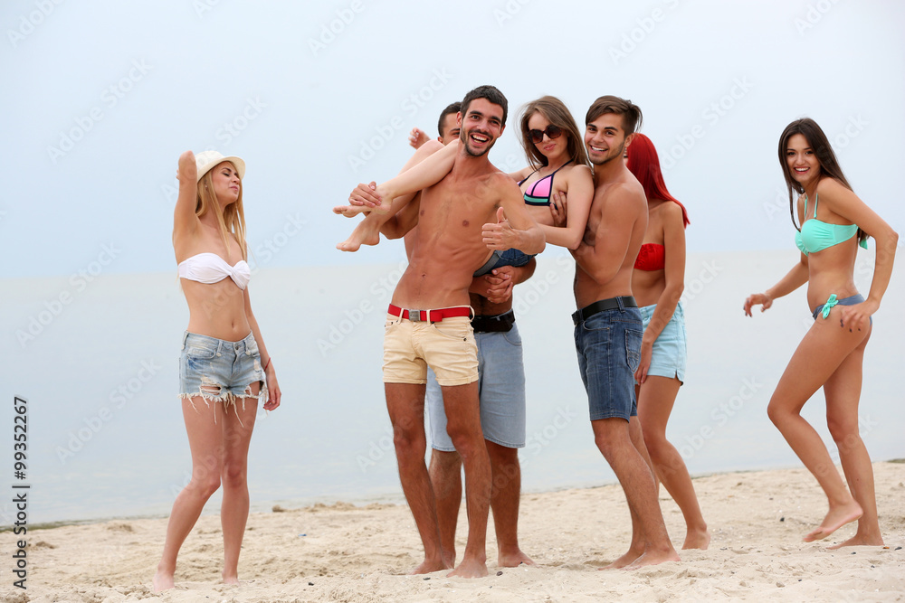 Beautiful young people having fun on beach Beautiful young people having fun on beach