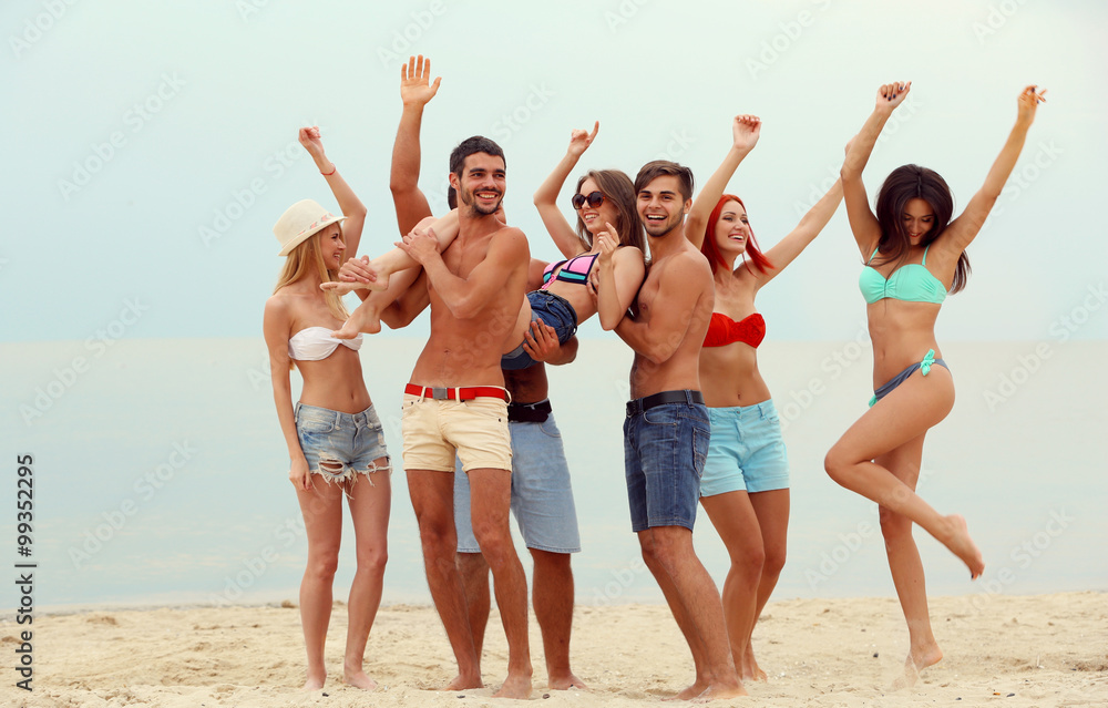 Beautiful young people having fun on beach Beautiful young people having fun on beach