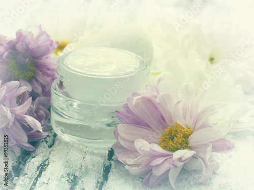 facial cream with fresh flowers