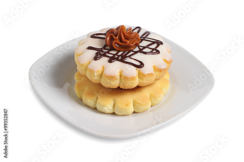 Small round cake with chocolate cream