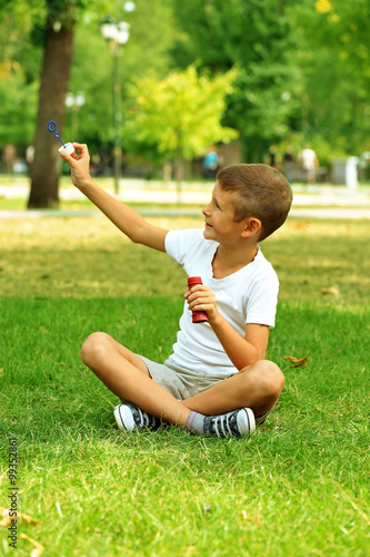 Little boy playing with bub...