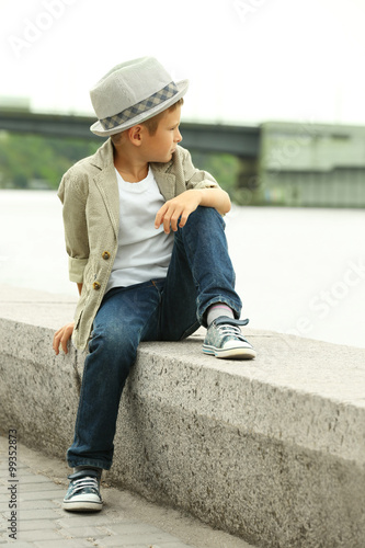 Little boy on the riverside