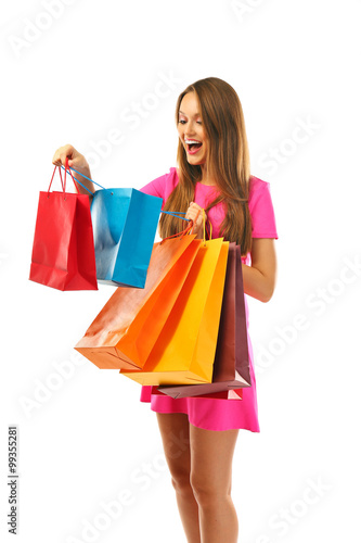 Young pretty woman with shopping packages isolated on white