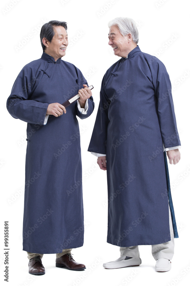 Cheerful senior men in traditional clothing Cheerful senior men in traditional clothing