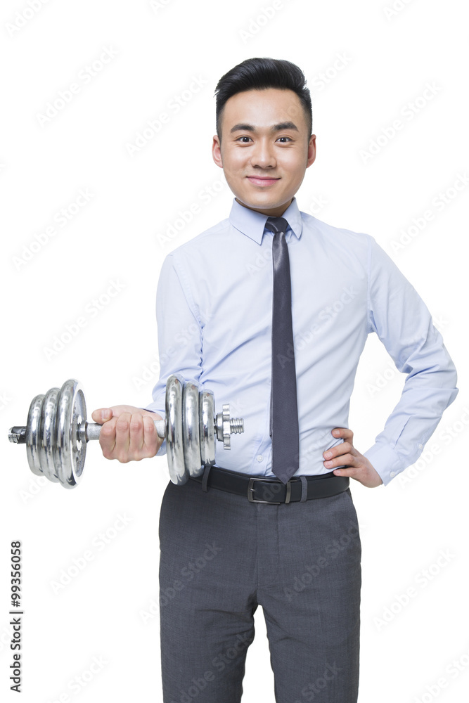 Naklejka premium Young businessman lifting weights