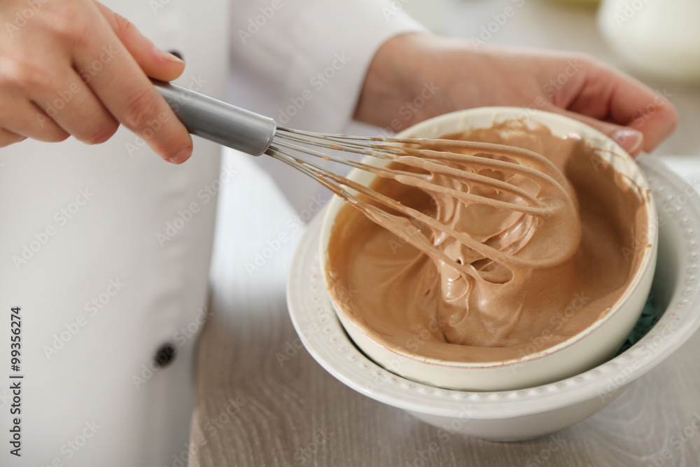 Cooking chocolate cream on kitchen Cooking chocolate cream on kitchen
