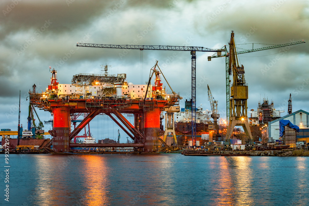 Shipyard industry - Oil Rig under construction in Gdansk, Poland. Shipyard industry - Oil Rig under construction in Gdansk, Poland.
