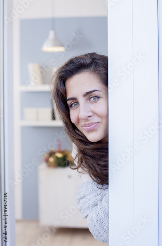 Portrait of beautiful woman looking through window. Morning scene,shallow depth of field Free Download Portrait of beautiful woman looking through window. Morning scene,shallow depth of field - GFXLoad