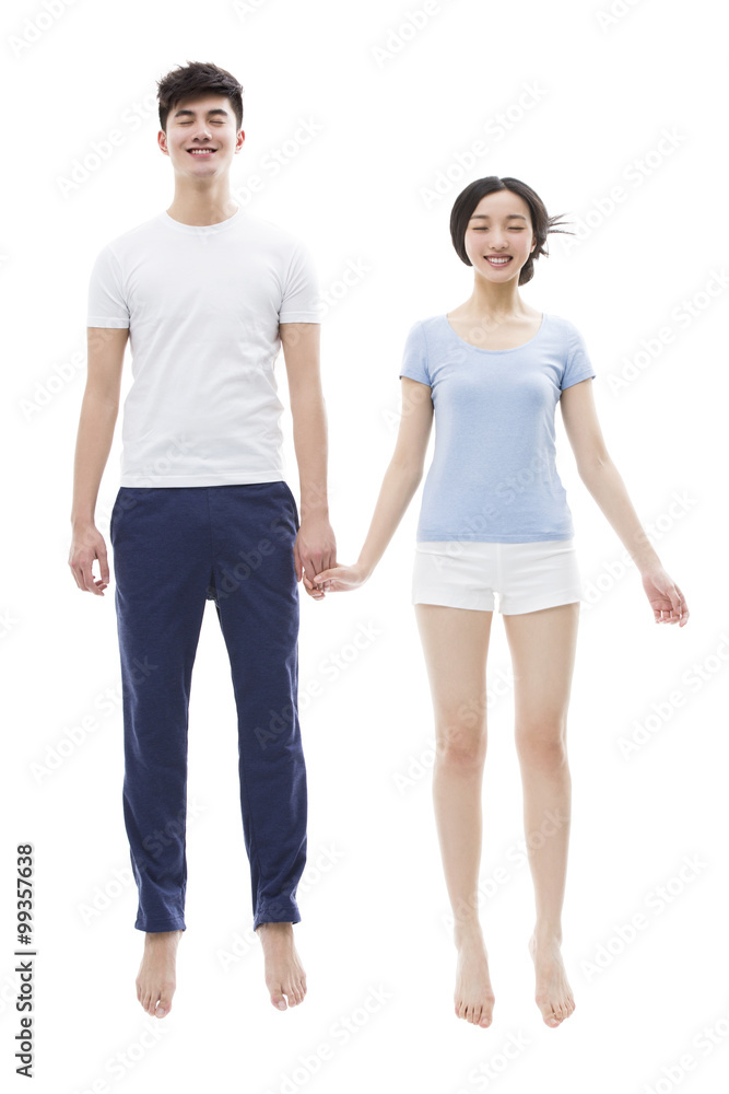 Young couple sleeping in mid-air Young couple sleeping in mid-air