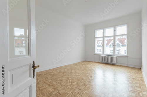 empty room, fresh renovated flat with wooden floor and white walls © hanohiki