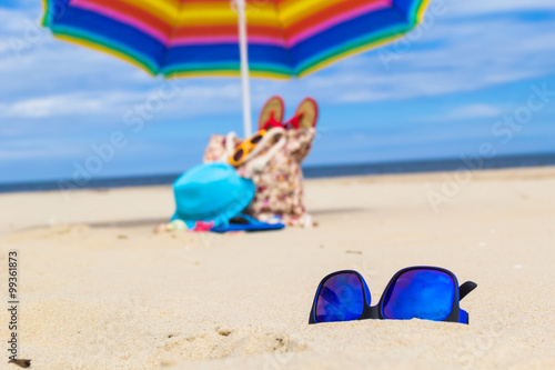 Wallpaper Mural Sunglasses gadgets sunbathers background Torontodigital.ca