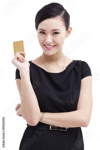 Happy businesswoman with bank card
