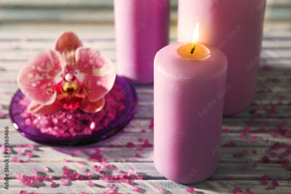 Spa set and candles on wooden background Spa set and candles on wooden background