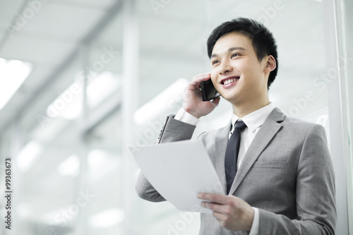 Young businessman talking on the phone