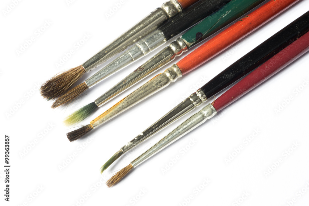 Fototapeta premium used paintbrushes isolated on white background