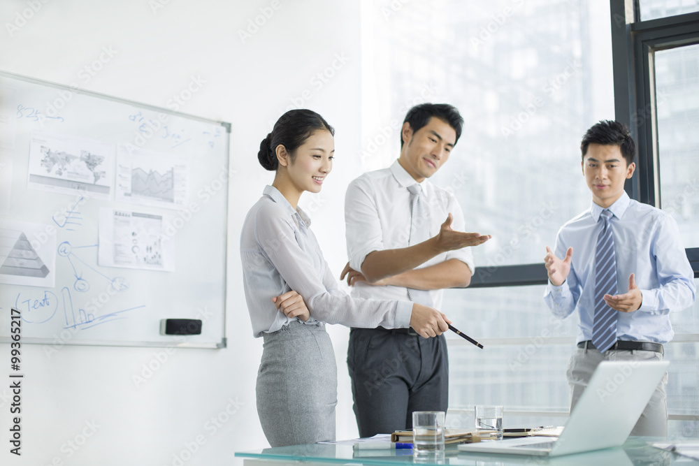 Young business people talking in meeting Young business people talking in meeting