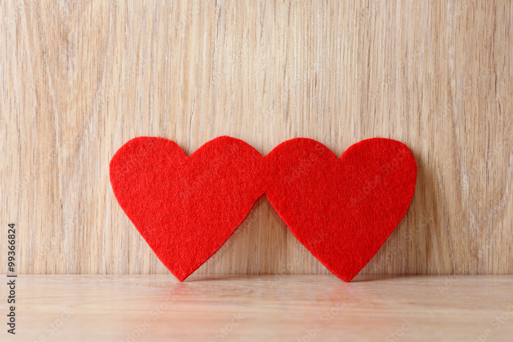 Red hearts on wooden background Red hearts on wooden background