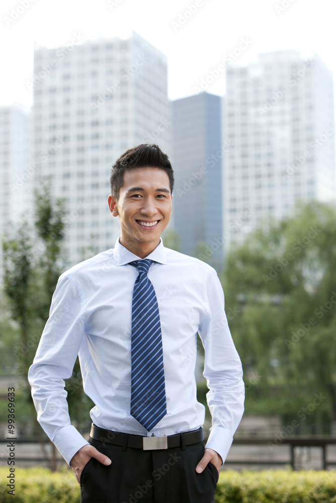 Confident Businessman Standing Outdoors Confident Businessman Standing Outdoors