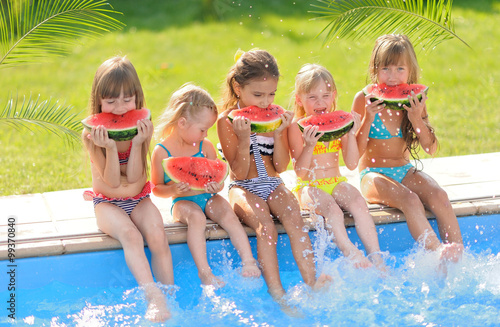 Portrait of happy children on nature in summer © zagorodnaya