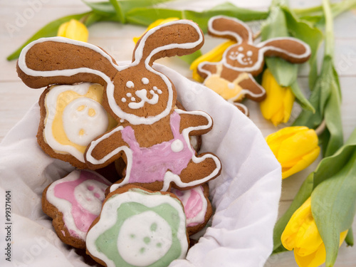 Easter Bunny cookies in the linen bag and yellow tulips