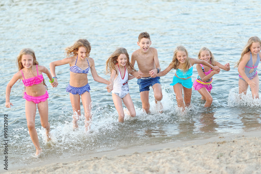 Portrait of happy children on nature in summer Portrait of happy children on nature in summer