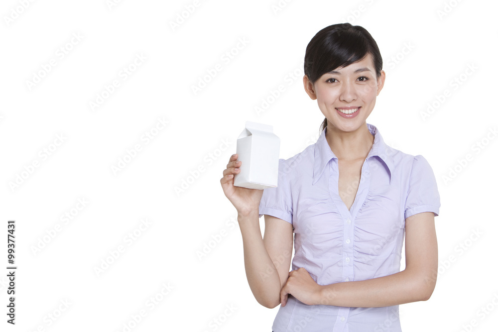 Businesswoman Holding a Carton of Milk Businesswoman Holding a Carton of Milk