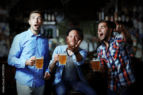 Young men with beer rejoice...