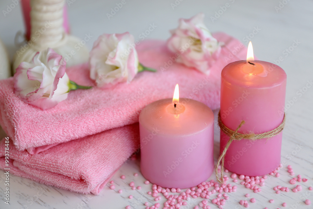 Beautiful composition of spa treatment on a white wooden table Beautiful composition of spa treatment on a white wooden table