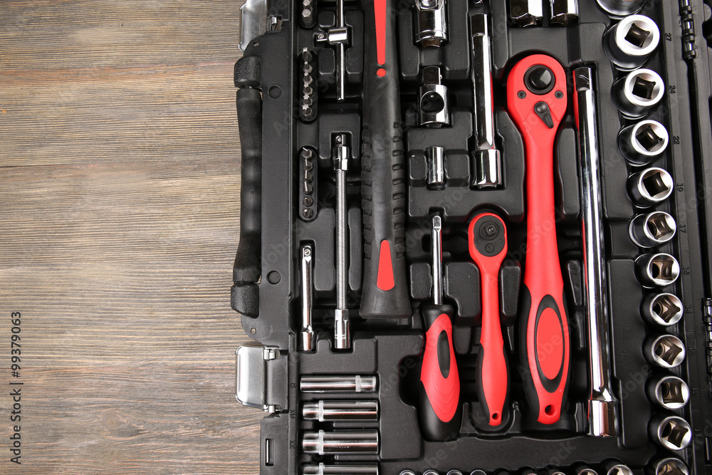 Fototapeta premium Tools in box on wooden background